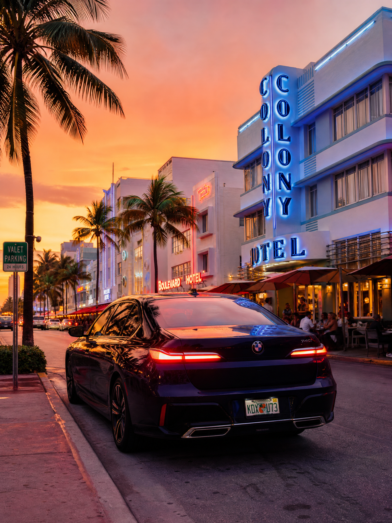 Luxury car on Ocean Drive at sunset